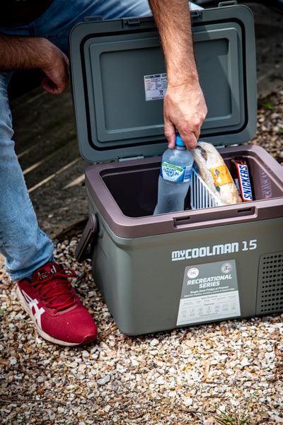 bottle of water being taken out of 15L Recreational Series myCOOLMAN